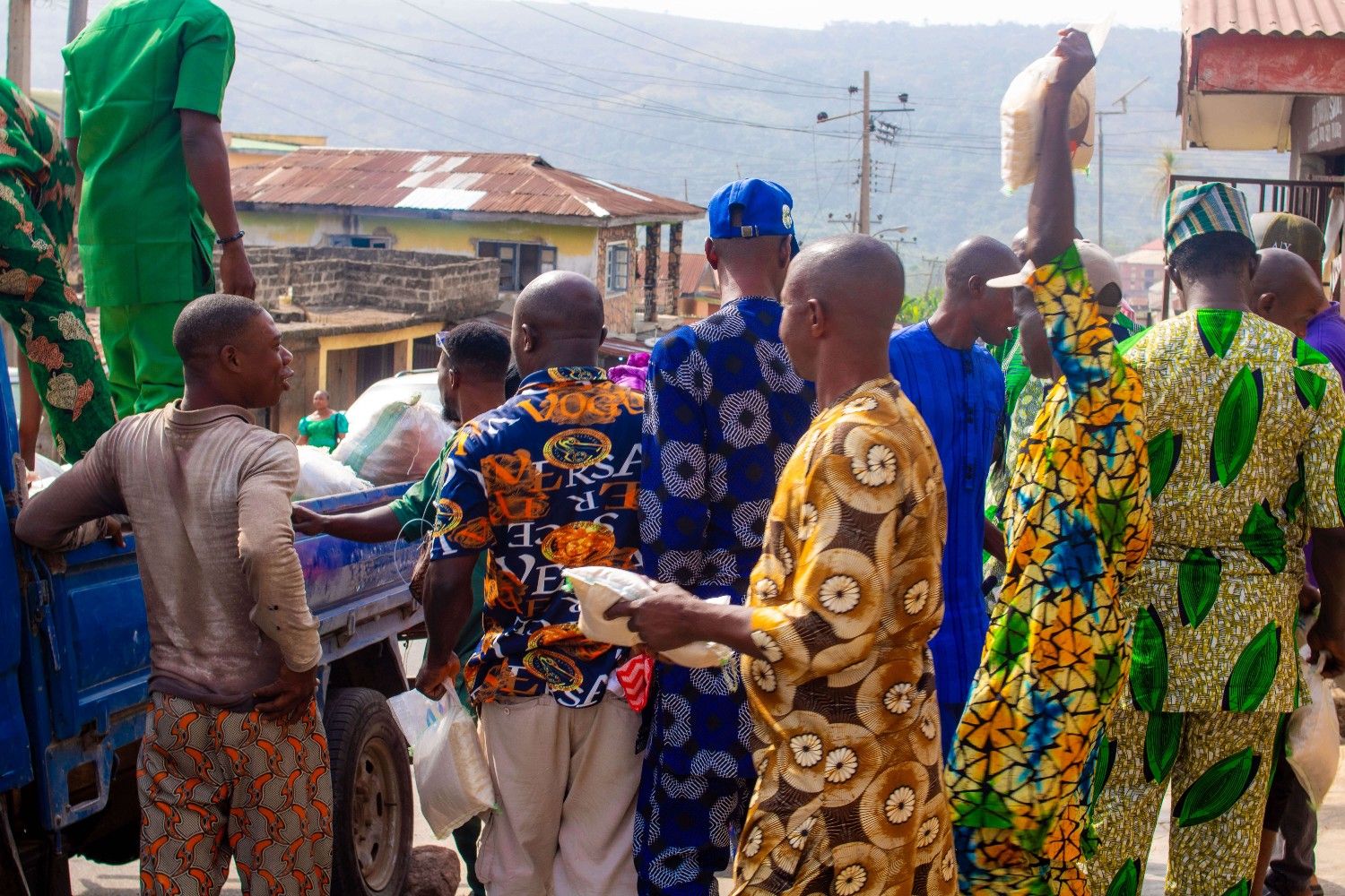 Volunteer serving tea to residents